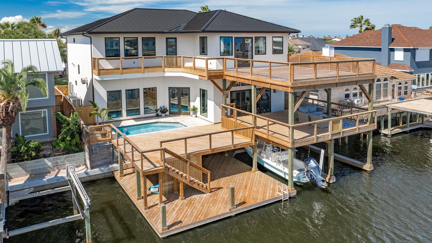Canal side of the home with its private dock, from above